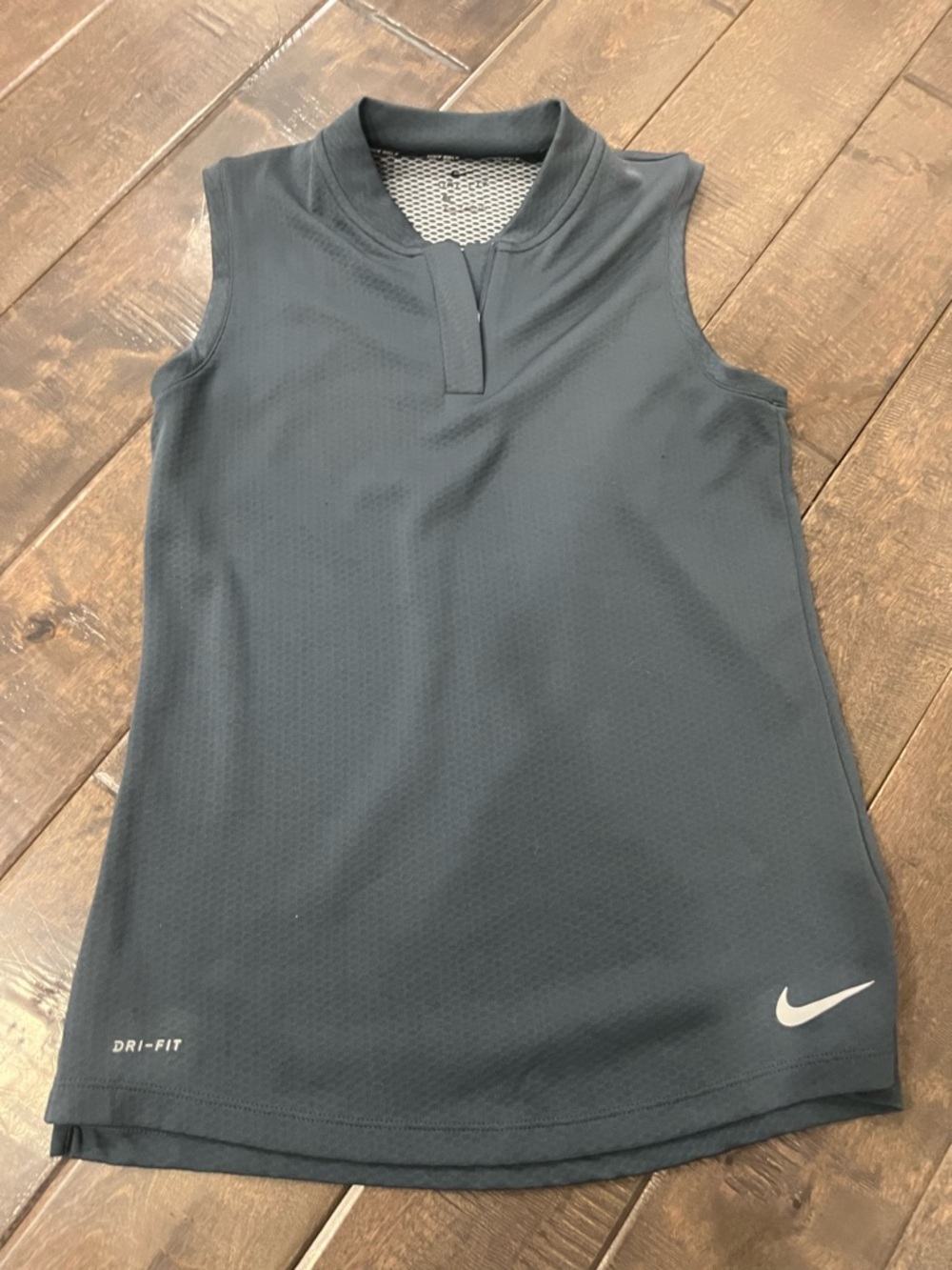 Nike Golf Sleeveless Dri-FIT Athletic Top - slate blue in color